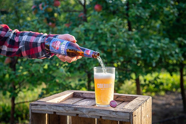 Ciderboys First Press being poured from a bottle into a glass